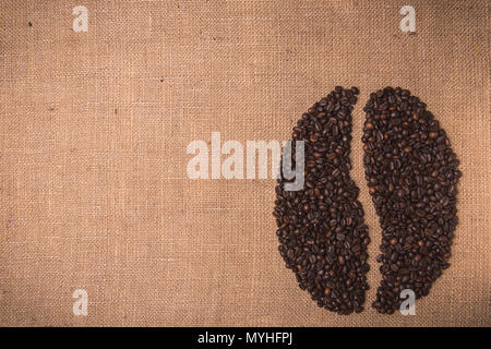 Portrait gerösteten Kaffee Form Beans Draufsicht auf die Textilindustrie Stockfoto