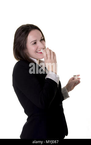 Junge schöne Frau mit einer Flasche Parfüm Stockfoto