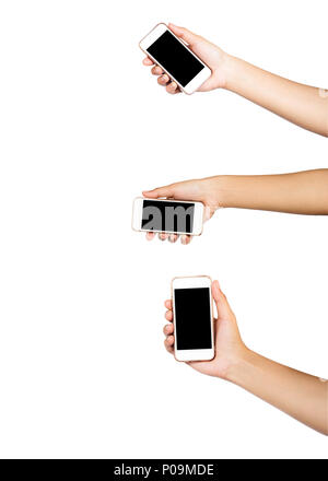 Weibliche Hand, die mehrere Touchscreen Tablet-PC oder Smartphone Bildschirm schwarz auf weißem Hintergrund. Freistellungspfaden. Stockfoto