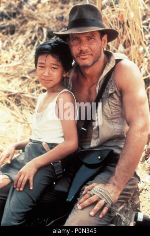 Original Film Titel: INDIANA JONES UND DER TEMPEL DES TODES. Englischer Titel: INDIANA JONES UND DER TEMPEL DES TODES. Regisseur: Steven Spielberg. Jahr: 1984. Stars: HARRISON Ford; JONATHAN KE QUAN. Credit: Lucasfilm LTD./PARAMOUNT/Album Stockfoto