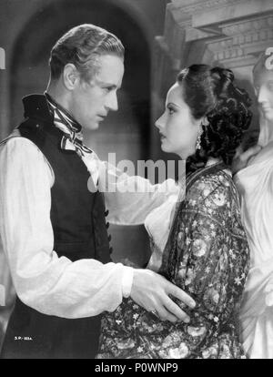 Original Film Titel: THE SCARLET PIMPERNEL. Englischer Titel: The Scarlet PIMPERNEL. Regisseur: Harold YOUNG. Jahr: 1934. Stars: Leslie Howard; Merle Oberon. Credit: LONDON FILME/UNITED ARTISTS/Album Stockfoto