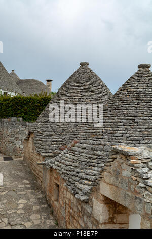Einzigartige kleine Süd Italia Stadt Alberobello mit antient Steine konische Häuser Trullo, Reiseziel, Region Apulien in der Nähe von Bari Stockfoto