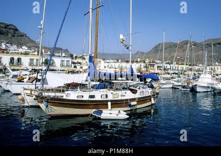 Puerto Mogán, yachting und Fischer Port; Urbanisierung. Stockfoto