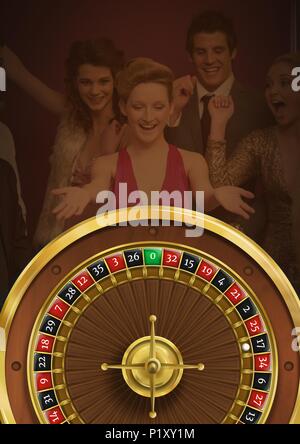 Roulette Rad und Leute Spaß haben im Hintergrund Stockfoto