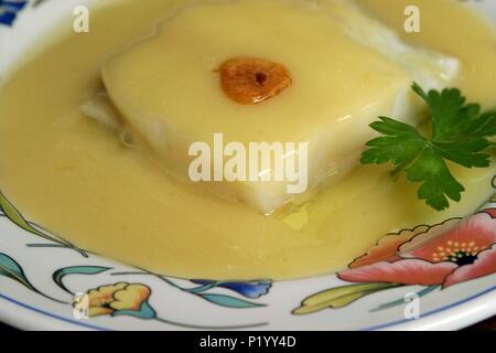 Bar/Restaurant 'La Farmacia"; ración de Bacalao al Pil Pil. Stockfoto