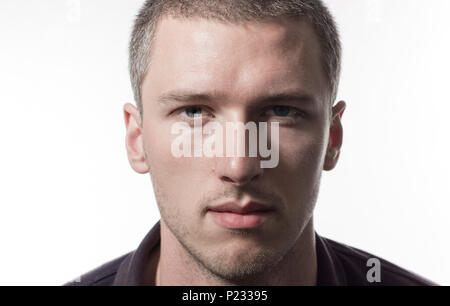 Porträt Porträt einer jungen gutaussehenden Mann auf weißem Hintergrund Stockfoto