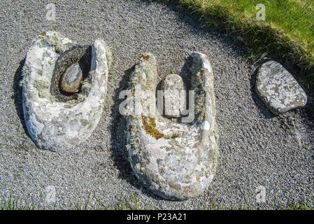 Stein querns in Jarlshof, archäologische Stätte, die 2500 v. Chr. vorgeschichtliche und nordischen Siedlungen in Sumburgh, Shetland Inseln, Schottland, Großbritannien Stockfoto