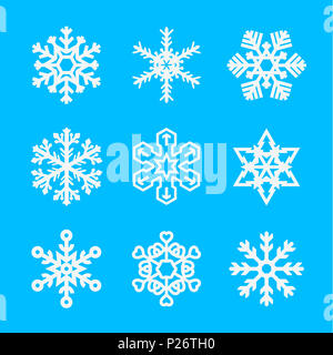 Mehrere verschiedene Arten von Schneeflocken. Schneeflocken in verschiedenen Formen auf blauem Hintergrund. Abbildung. Stockfoto