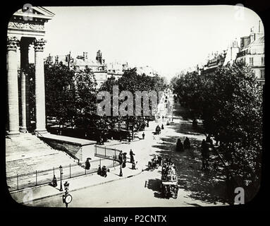 . Boulevard de la Madeleine, Paris. Englisch: Ein Blick auf den Boulevard de la Madeleine in Paris, mit Pferden und Wagen gefüllt, und die Ecke der Église de la Madeleine auf der linken Seite. Um 1910 8 Boulevard de la Madeleine, Paris Ca. 1910 Stockfoto