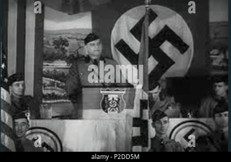 . German American Bund Rallye: Bund-Chef Fritz Kuhn (Mitte). Noch von 'March Of Time' - outtakes - Geschichte RG -60.0699, Band 316. 01/05/1938. Unbekannt 29 Kuhn German American Bund Rallye 19380105 NARA 1. Stockfoto