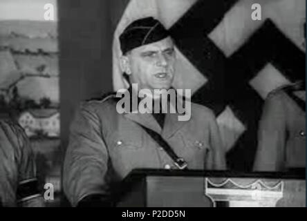 . German American Bund Rallye: Bund-Chef Fritz Kuhn. Noch von 'March Of Time' - outtakes - Geschichte RG -60.0699, Band 316. 01/05/1938. Unbekannt 29 Kuhn German American Bund Rallye 19380105 NARA 2 Stockfoto