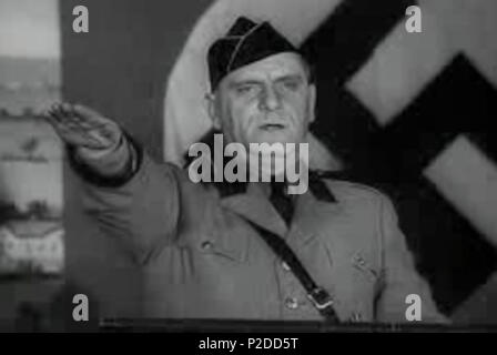 . German American Bund Rallye: Bund-Chef Fritz Kuhn. Noch von 'March Of Time' - outtakes - Geschichte RG -60.0699, Band 316. 01/05/1938. Unbekannt 29 Kuhn German American Bund Rallye 19380105 NARA 5 Stockfoto