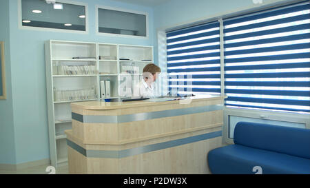 Krankenschwester annehmen Anruf am Krankenhaus Empfang Stockfoto