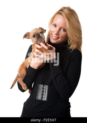 Junge Frau mit Ihrem Welpen Griffon bruxellois Stockfoto