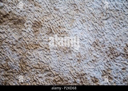 Hintergrund Textur der mittelalterlichen Natursteinmauer strukturierten Hintergrund oder Begrenzung der Fels nahtlose abstrakt und Fragment einer Wände aus einer Grau. Stockfoto