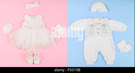 Eine schöne insgesamt für einen neugeborenen Jungen und Kleid für ein neugeborenes Mädchen, Ansicht von oben. Baby Kleidung. Stockfoto