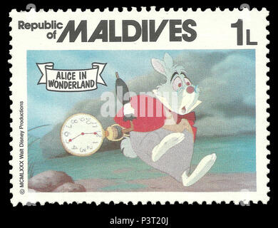 Republik Malediven - Stempel 1980: Colour Edition auf dem Walt Disney, zeigt Alice im Wunderland Stockfoto