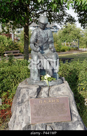 Schwarz Bronze Japanische Fischer's Memorial Statue in der Britannia Erbe Werft, Steveston, Richmond, British Columbia, Kanada Stockfoto