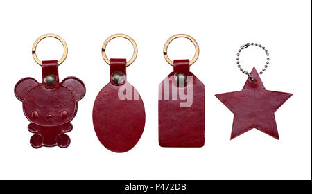 Schlüsselanhänger aus Leder auf weißem Hintergrund. Freistellungspfaden. Stockfoto