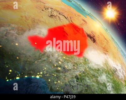 Sonnenaufgang über Niger in Rot hervorgehoben auf dem Modell des Planeten Erde im Weltraum. 3D-Darstellung. Elemente dieses Bild von der NASA eingerichtet. Stockfoto