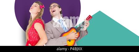 Paar singen und spielen Musik Stockfoto