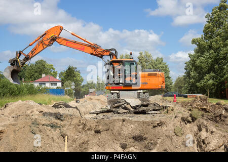 Bagger arbeiten auf der Baustelle Stockfoto