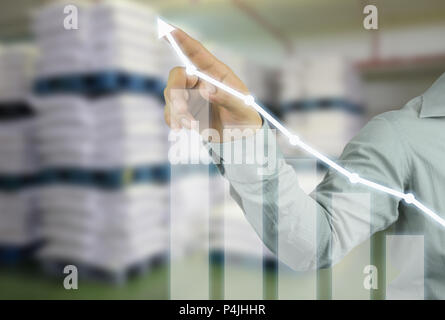 Geschäftsmann Zeiger der Rentabilität graph in ihrer Arbeit Konzept Geschäft auf Lager blur Hintergrund nach oben. Stockfoto