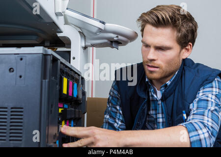 Man Service Kopierer Stockfoto