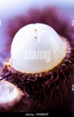 Eine Nahaufnahme eines geöffneten Rambutan Stockfoto