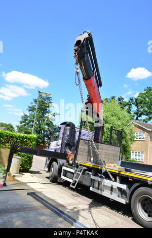 Ein Kran Stahl für eine Nebenstelle an einem Haus in der UK Stockfoto