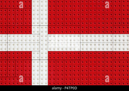 Dänische Flagge mit kleinen Ziegeln aus Kunststoff Stockfoto