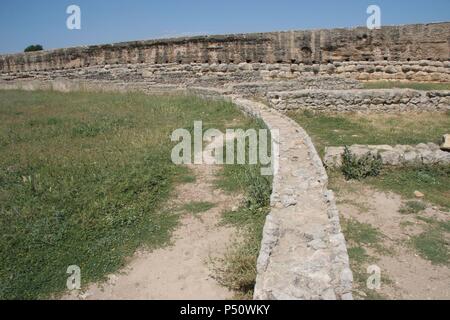 Römische Stadt Ampurias. Außerhalb des Amphitheaters. Gebaut 1. Jahrhundert nach Christus. Regio'n Alt Emporda". In der Provinz Girona. Katalonien. Spanien. Stockfoto