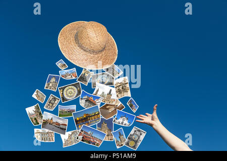 Die weibliche Hand wirft einen Strohhut, aus denen fliegen die Fotos der Prager Sehenswürdigkeiten. Blue Sky ist im Hintergrund. Stockfoto