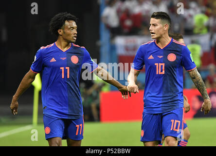 Kasan, Russland. 24. Juni, 2018. Kolumbien James Rodriguez (R) und Juan Cuadrado werden während der FIFA WM 2018 Gruppe H Übereinstimmung zwischen Polen und Kolumbien in Kasan, Russland, Juni 24, 2018 gesehen. Credit: Er Canling/Xinhua/Alamy leben Nachrichten Stockfoto