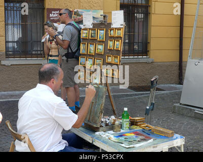 STREET ARTIST in Malcesine, Gardasee, Italien. Foto: Tony Gale Stockfoto