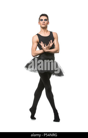 Stattliche Ballett Künstler in Tutu Rock. junger Mann in Gymnastik Kleidung. Studio erschossen. kopieren. Stockfoto