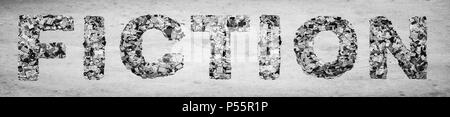 Das Wort Fiktion von der Zeitung Konfetti auf altem Papier Stockfoto
