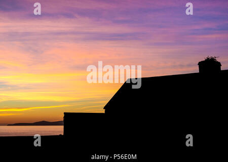 Sonnenuntergang über dem Atlantischen Ozean weg von Valentia Island, County Kerry Irland Stockfoto