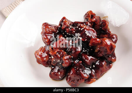 Chinesische Küche - süß und sauer Spare Ribs Stockfoto