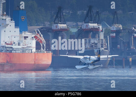 Harbour Air Wasserflugzeuge Cessna 208 Caravan Wasserflugzeug, aus dem Wasser an der Vancouver Harbour Flight Center, BC, Kanada. Stockfoto