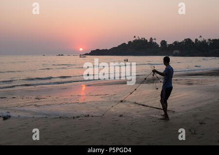 Sonnenuntergang über Madrid Beach, Goa, Indien Stockfoto