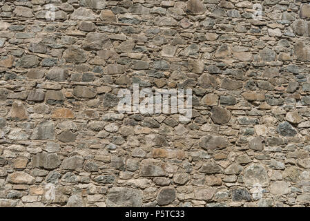 Steinmauer einer alten Burg Stockfoto