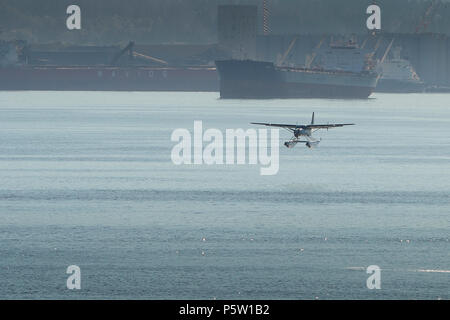 Seair Wasserflugzeuge Cessna 208 Caravan Wasserflugzeug Landung auf dem Wasser im Hafen von Vancouver Airport, BC, Kanada. Stockfoto