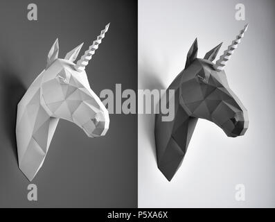 Kontrast Collage von schwarzen und weißen Papier Einhorn Köpfe. Innovative interior design Details. Gerade Linien. Ursprüngliche geometrische Form. Schatten. Konzept der Außenaufnahmen. Stockfoto
