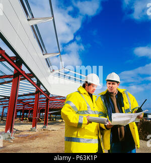 Führungskräfte der Inspektion eine Baustelle. Stockfoto