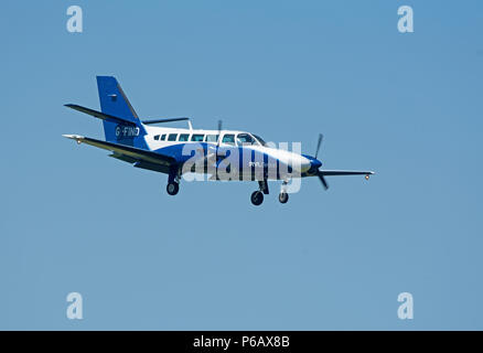 Eine Cessna 406 von Atlantic Airlines Ltd Anfahren/Landung auf dem Inverness Dalcross Flughafen im Norden von Schottland. Stockfoto