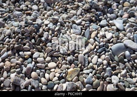 PebblesPebble Steine in verschiedenen Farben und Formen Hintergrund Stockfoto