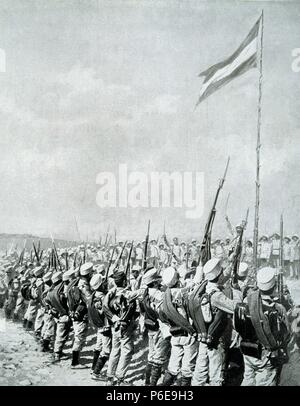 GUERRA DE MELILLA O GUERRA DEL RIF 1890-1909. REGENCIA DE MARIA CRISTINA DE HABSBURGO. REINADO DE Alfonso XIII. "ACLAMACIONES A LA BANDERA ESPAÑOLA IZADA EN EL MONTE GURUGU, AÑO 1909'. GRABADO DE L¿Abbildung. Stockfoto