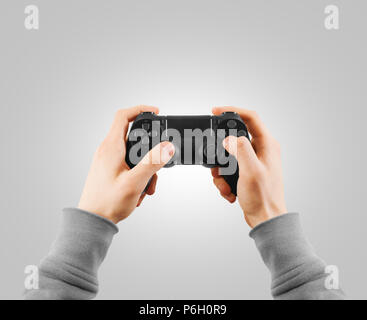 Hand halten neue Joystick isoliert. Gamer spielen Spiel mit Gamepad Controller. Stockfoto