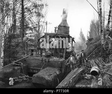 . Englisch: Esel Motor und Crew, Wynooche Timber Company, wahrscheinlich in Grays Harbor County, CA. 1921. Englisch: Legende auf Bild: Wynoche Bauholz Co Kinsey Foto. Nr. 15 PH-Coll 516.5228 Die Wynooche Holz unternehmen kann. 1913 mit Hauptsitz in Hoquiam und Protokollierung der Vorgänge in Montesano. Es war für Wynooche Tal im Nordosten Grays Harbor County genannt. Wynooche Timber Company wurde von Schafer Brüder Logging Company gekauft. 1927. Themen (LCTGM): Dampf Esel - Washington (State); Logger; Holzindustrie - Washington (State); Wynooche Timber Company - Leute - washingt Stockfoto